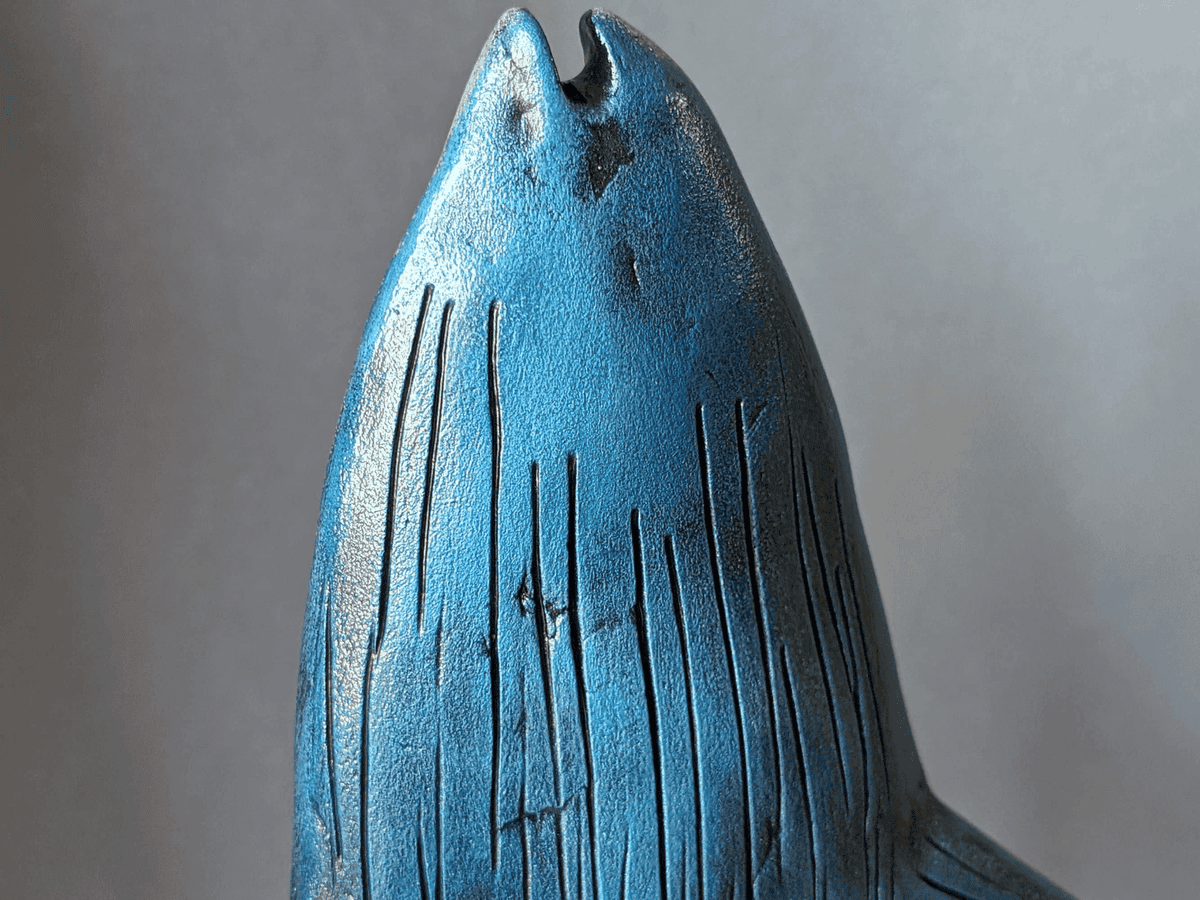 sardine-sentinel-evolution-statue-sculpture-08